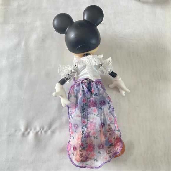 Disney Minnie Mouse Fashion Doll in White Top, Denim Shorts, and Floral Skirt - Picture 2 of 3